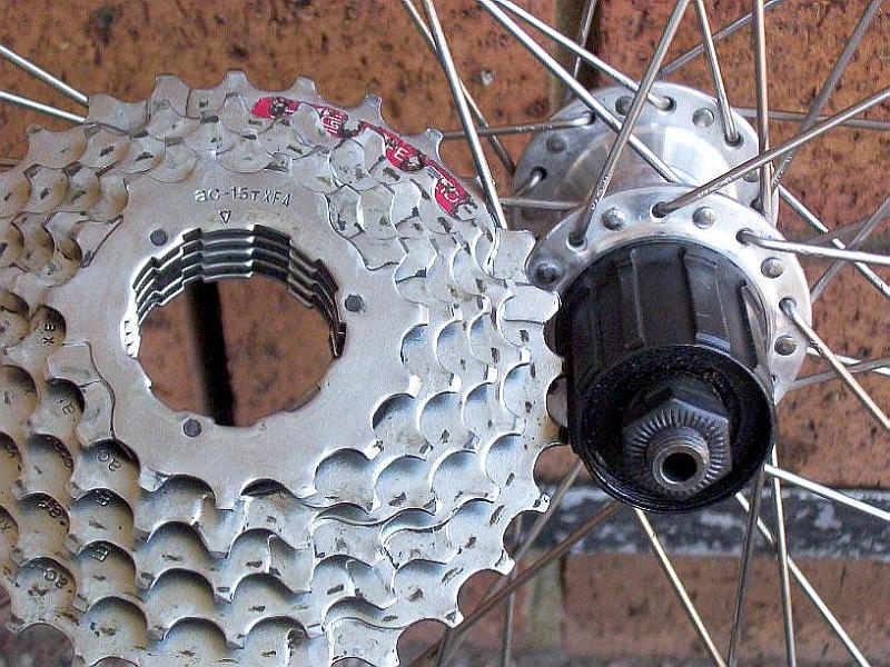 A real bicycle cassette separated from a Shimano-style freehub body